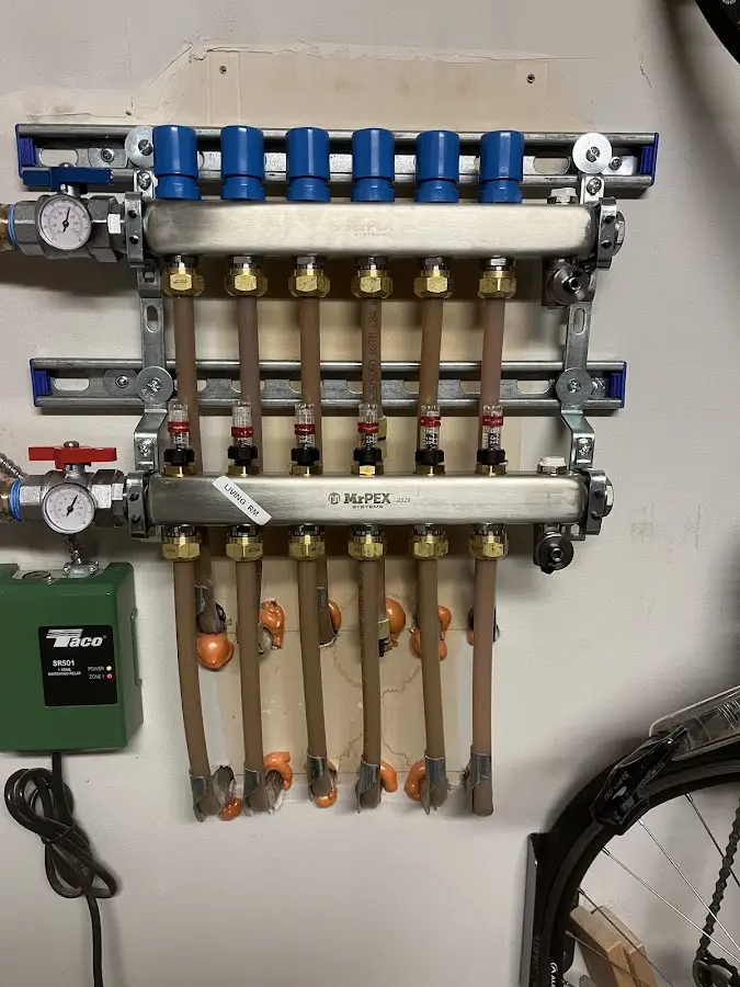 Plumber performing Water Heater Repair at a residential property in Pharr